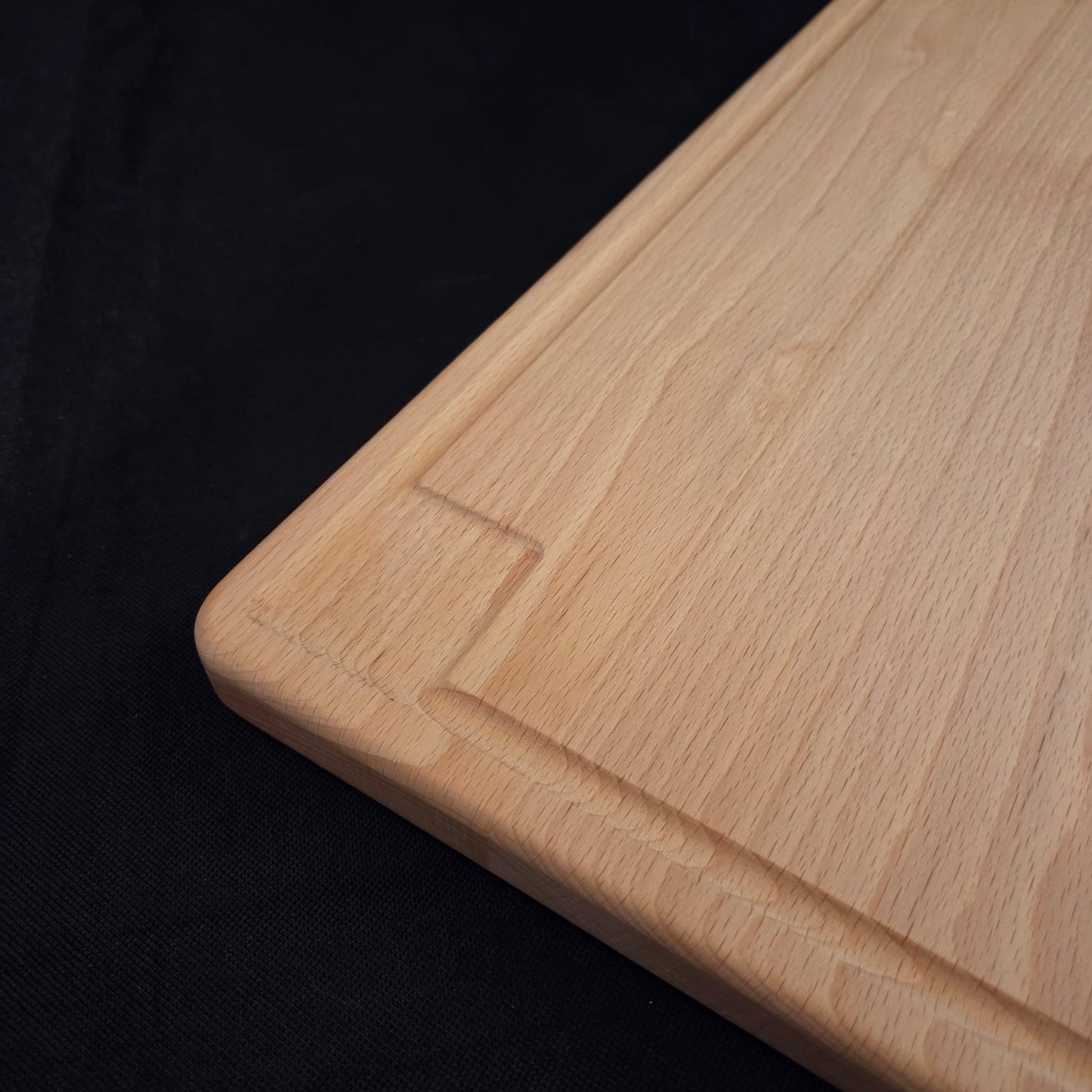 Planche à découper en Hêtre avec récupérateur de jus périphérique