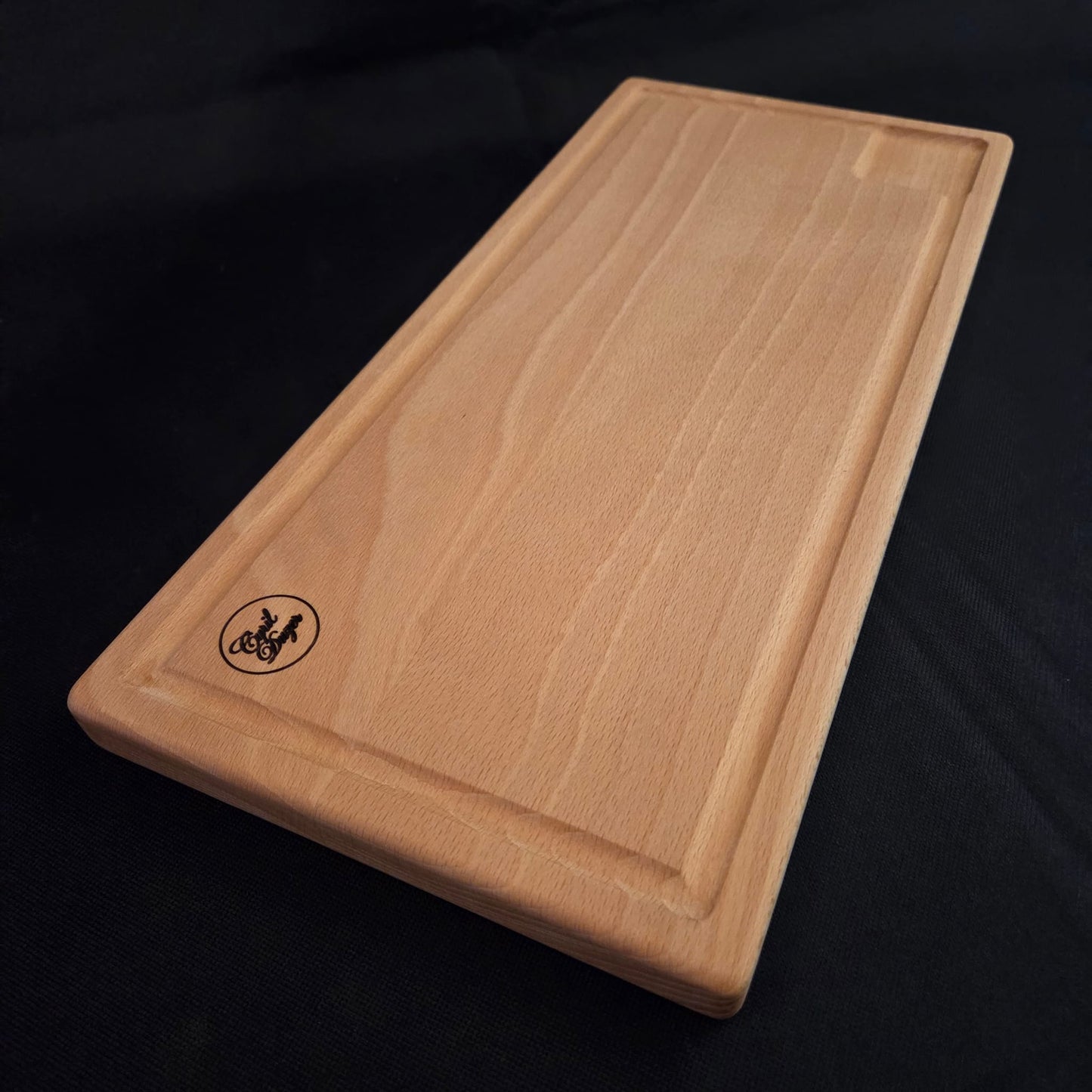 Planche à découper en Hêtre avec récupérateur de jus périphérique